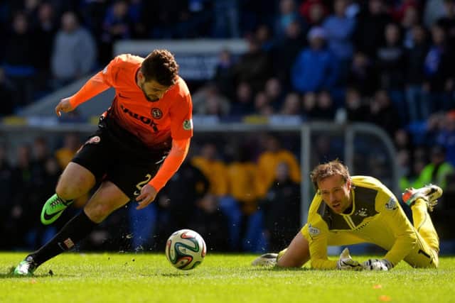 Steve Simonsen can only watch as Nadir Ciftci seals the win for United. Picture: Getty