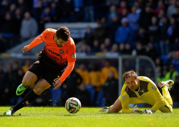 Steve Simonsen can only watch as Nadir Ciftci seals the win for United. Picture: Getty