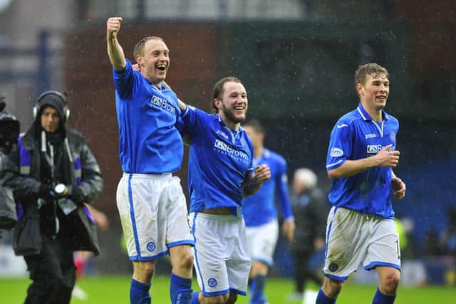 Steven Anderson, Stevie May and David Wotherspoon celebrate at the end with fans after winning Sunday's Scottish Cup semi final. Picture: Robert Perry