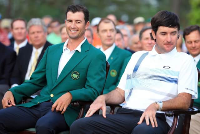 Adam Scott and Bubba Watson wait for the presentation ceremony at Augusta National. Picture: Getty