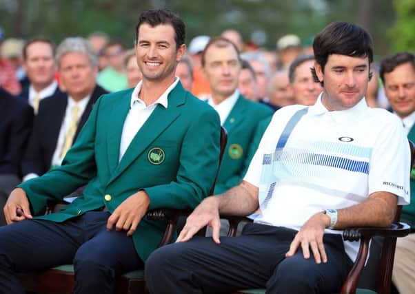 Adam Scott and Bubba Watson wait for the presentation ceremony at Augusta National. Picture: Getty