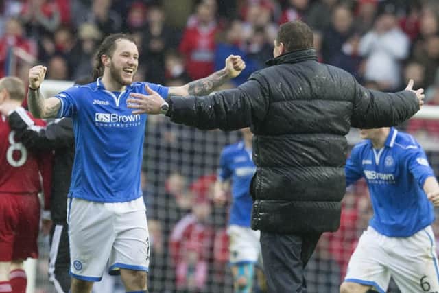 St Johnstone's Stevie May celebrates with his manager Tommy Wright. Picture: PA