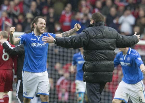St Johnstone's Stevie May celebrates with his manager Tommy Wright. Picture: PA