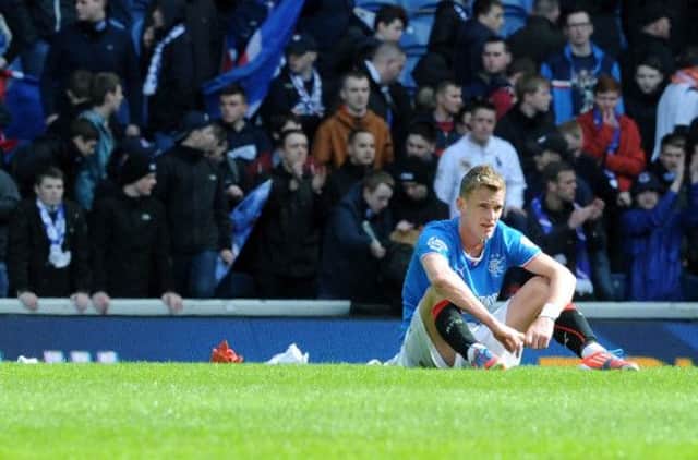 Dean Shiels cuts a dejected figure after Rangers were knocked out of the Scottish Cup. Picture: Lisa Ferguson