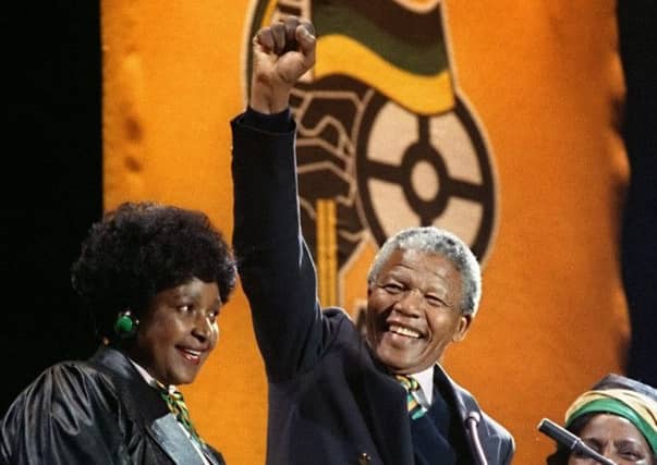 On this day in 1990 Nelson Mandela, pictured with his then wife Winnie, was hailed by a crowd of 70,000 at Wembley Stadium. Picture: Getty