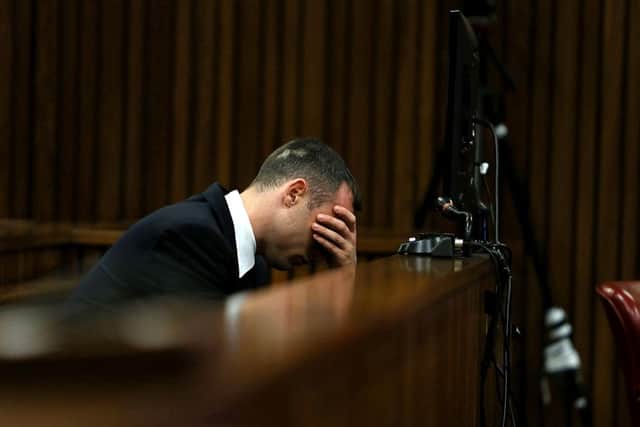 Oscar Pistorius listens to evidence in the Pretoria High Court on April 15, 2014, in Pretoria, South Africa. Picture: Getty