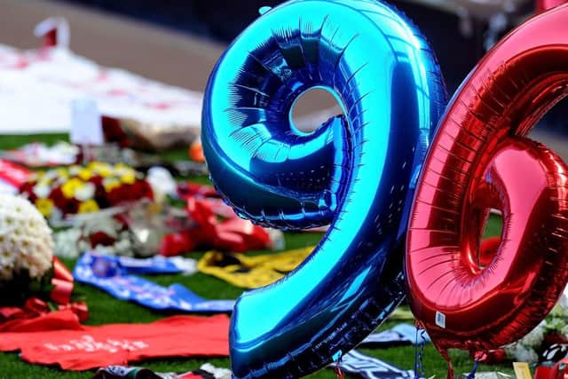 Tributes and balloons were left on the pitch at Anfield. Picture: Getty