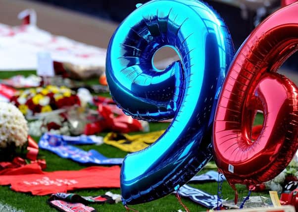 Tributes and balloons were left on the pitch at Anfield. Picture: Getty