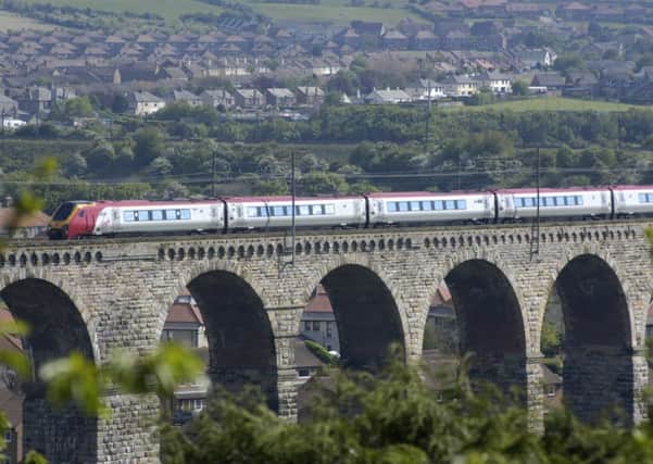 A Virgin train near Berwick Upon Tweed. Virgin spent almost six times more than East Coast on rolling stock. Picture: TSPL