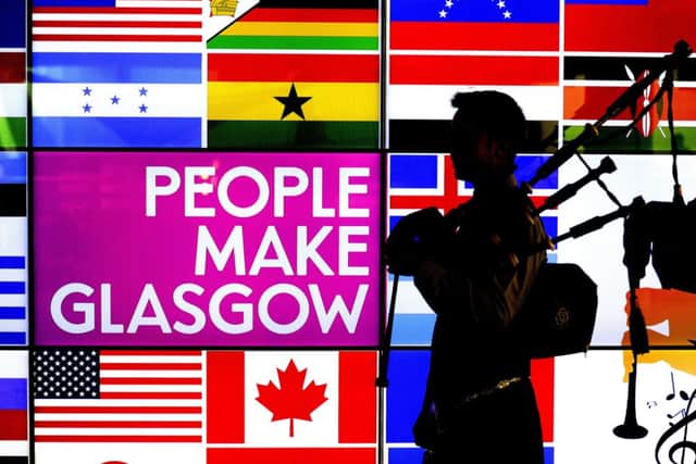 A piper helps launch the world's biggest celebration of piping in Glasgow. Picture: John Devlin