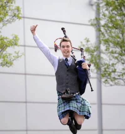 Piper Chris Gray and drummer Craig Baxter help launch Glasgow International Piping Festival. Picture: John Devlin