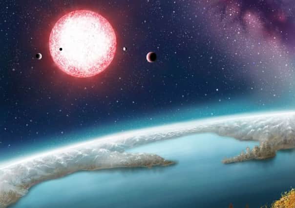 An artists depiction of Earth-like Kepler-186f with its parent star in the distance. Picture: PA