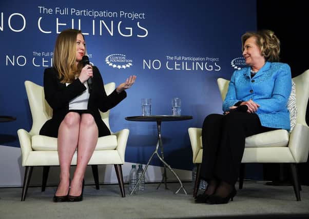 Chelsea Clinton on stage with her mother Hillary Rodham Clinton at an event in New York. Picture: Getty