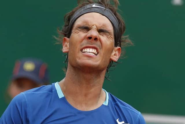 Rafael Nadal lost to David Ferrer on clay for the first time in ten years yesterday. Picture: AP