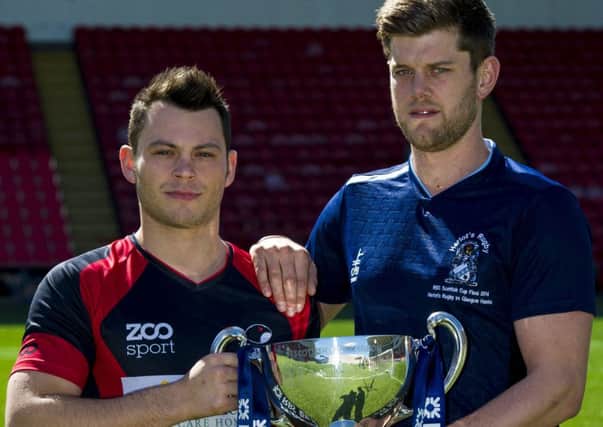 Paddy Boyer of Glasgow Hawks, left, and Jack Turley of Heriots with the RBS Cup. Picture: SNS