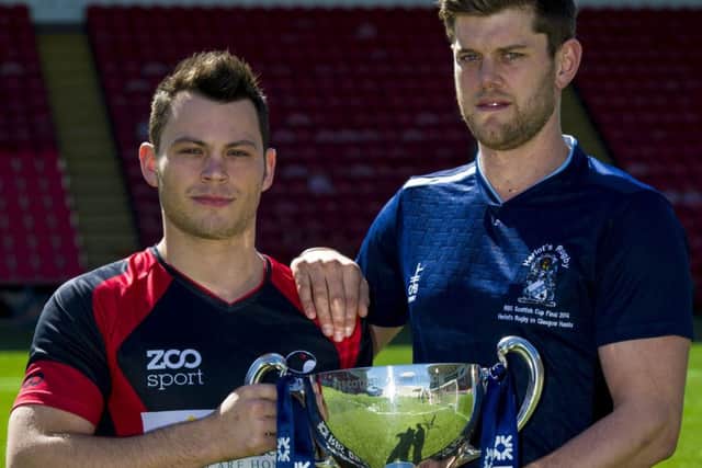Paddy Boyer of Glasgow Hawks, left, and Jack Turley of Heriots with the RBS Cup. Picture: SNS