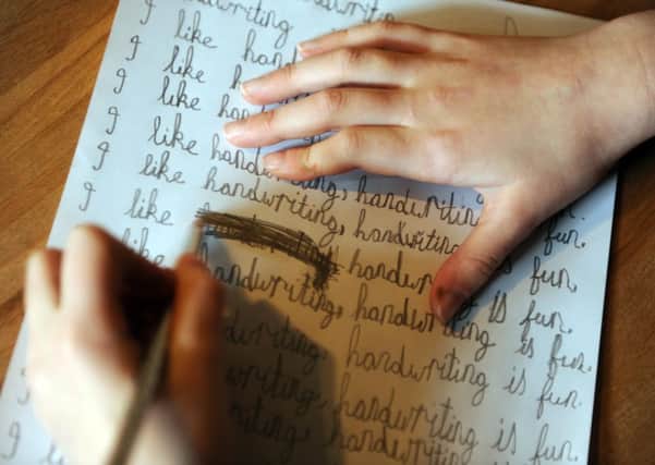 In a world where word processors and computers are increasingly the norm, has handwriting had its day? Picture: Phil Wilkinson