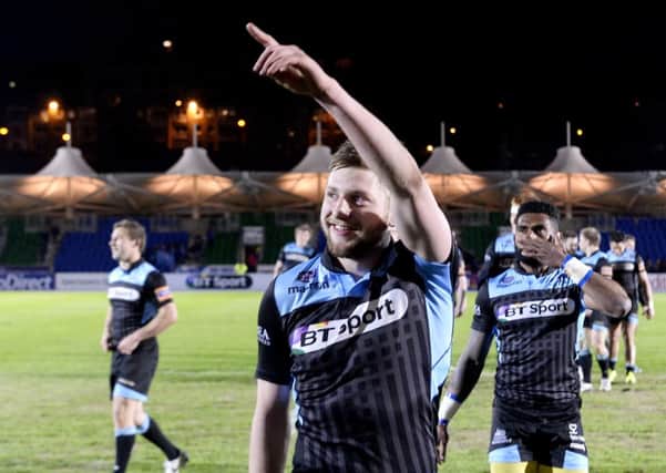 Glasgow Warriors' Finn Russell is all smiles at full-time. Picture: SNS