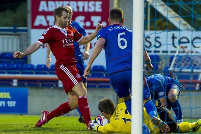 Niall McGinn is thwarted by ICT keeper Dean Brill. Picture: SNS