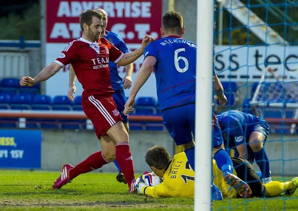 Niall McGinn is thwarted by ICT keeper Dean Brill. Picture: SNS