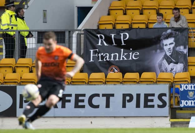 The traveling Dundee Utd fans unveiled a banner in memory of late club hero Frank Kopel. Picture: SNS