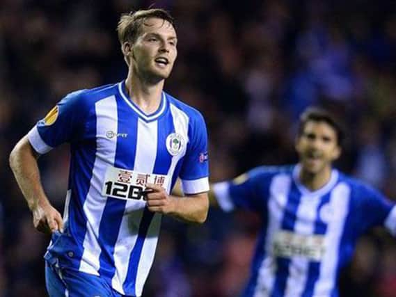 Nick Powell celebrates scoring for Wigan. Picture: Getty