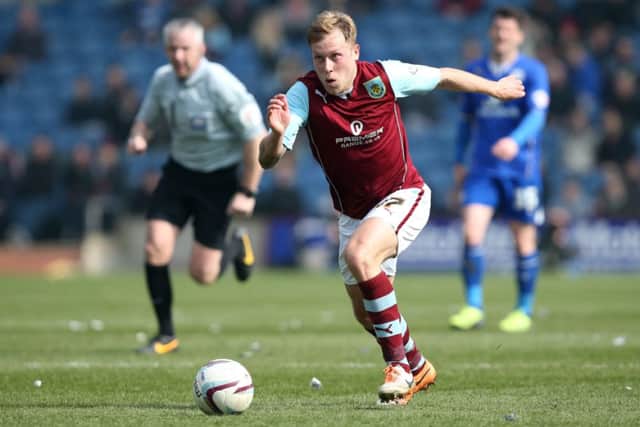 Former Falkirk player Scott Arfield has emerged as a key man for Burnley, who could be promoted today. Picture: Getty