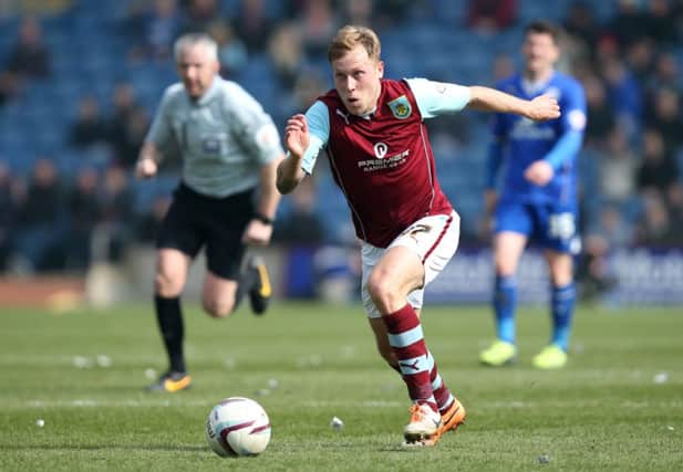 Former Falkirk player Scott Arfield has emerged as a key man for Burnley, who could be promoted today. Picture: Getty