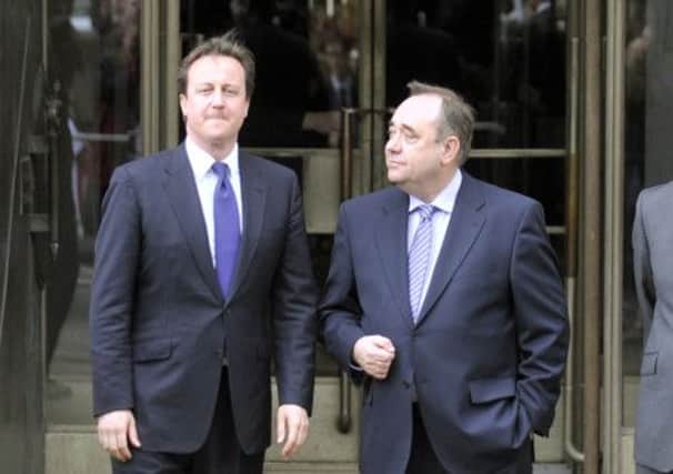 David Cameron and Alex Salmond face an intertwined battle in the referendum and General Election. Picture: Phil Wilkinson