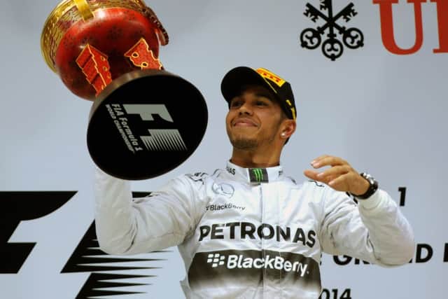 Lewis Hamilton cant hide his delight after winning the China Grand Prix. Picture:Getty