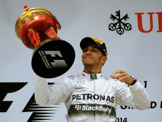 Lewis Hamilton cant hide his delight after winning the China Grand Prix. Picture:Getty