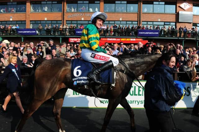 Barry Geraghty astride Shutthefrontdoor after riding the favourite to a thrilling victory. Picture: Barry Cronin/PA