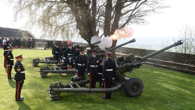 Gunners from 105th Regiment Royal Artillery fire a 21-Gun Salute at Stirling Castle. Picture: PA