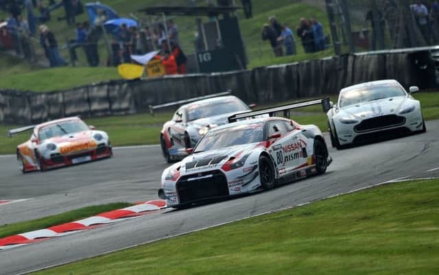 Sir Chris Hoy shows his prowess at the wheel during Race One of the Avon Tyres British GT Championship at Oulton Park. Picture: PA