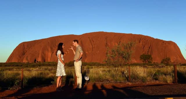 The Duke and Duchess of Cambridge watched the sun set over Uluru. Picture: Getty