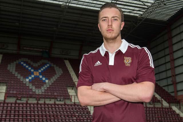 Danny Wilson models the new Hearts kit at Tynecastle. Picture: SNS