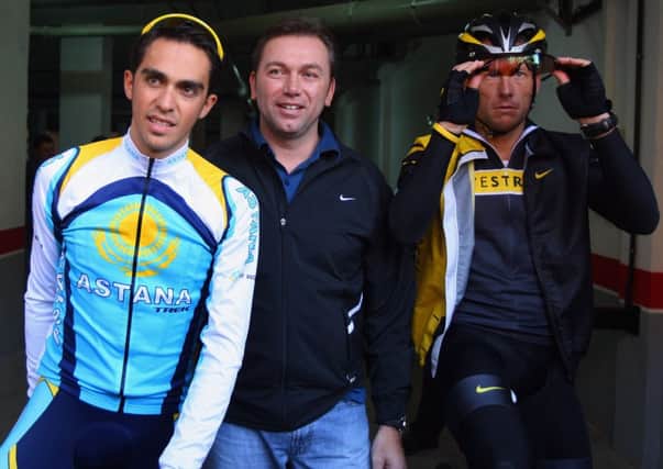 Johan Bruyneel, centre, may appeal the decision. Picture: Getty