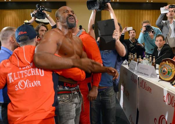 Shannon Briggs is held back by security after he challenged Wladimir Klitschko to a fight. Picture: Getty