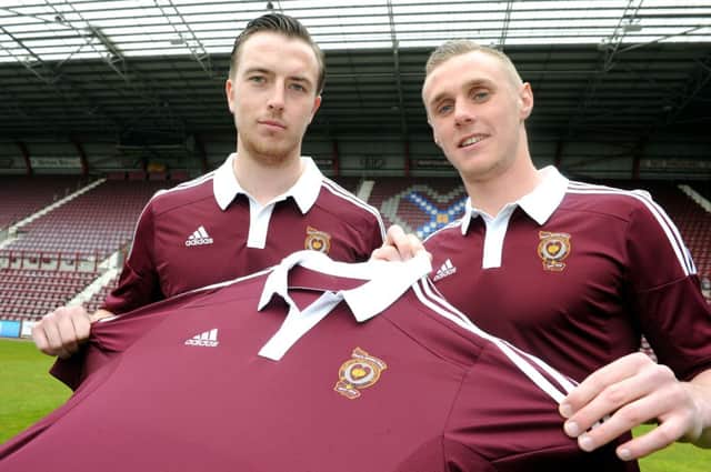 Danny Wilson, left, and Kevin McHattie unveil Hearts new strip. Picture: Lisa Ferguson