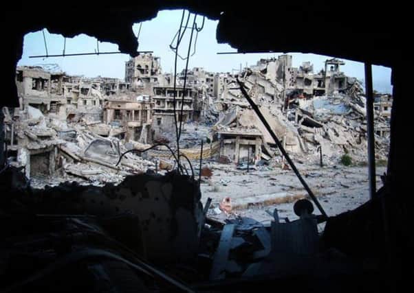 Damaged buildings in the Jouret al-Chiyah neighborhood, Homs province, Syria. Picture: AP