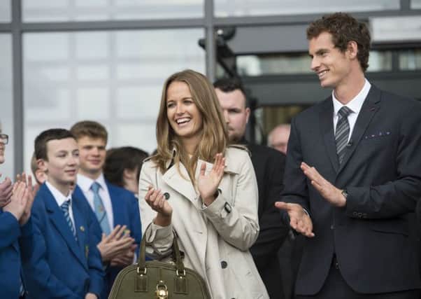 Andy Murray and his partner Kim Sears applaud their guard of honour, comprised of Dunblane High School pupils. Picture: SNS