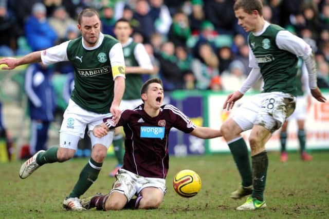 James McPake, left, in action last season, hopes to face Hearts. Picture: Jane Barlow