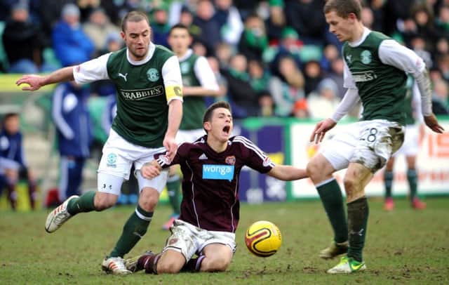 James McPake, left, in action last season, hopes to face Hearts. Picture: Jane Barlow