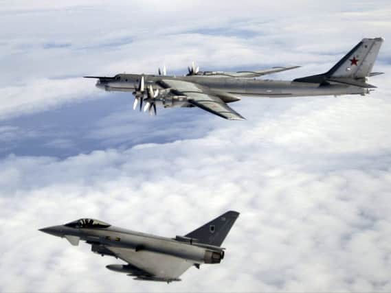 File photo of a Typhoon aircraft escorting a Tupolev Tu-95. Picture: MoD