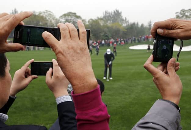 Spectators at this summers Open at Hoylake will be encouraged to use their phones. Picture: Reuters