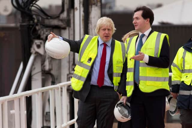 Johnson and Osborne: high-visibility candidates to take over from Cameron. Picture: Getty