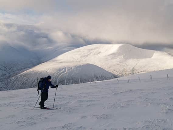 A skier pictured on Meall a Chaorainn - but how do you set up a meeting point if no one can pronounce it? Picture: geograph.co.uk