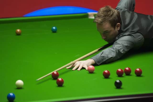 Ali Carter in action against Mark Selby during the Dafabet World Snooker Championships at The Crucible, Sheffield.Picture: PA