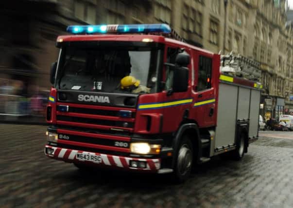 Fire service personnel were called to the blaze at 1:15am. Picture: TSPL