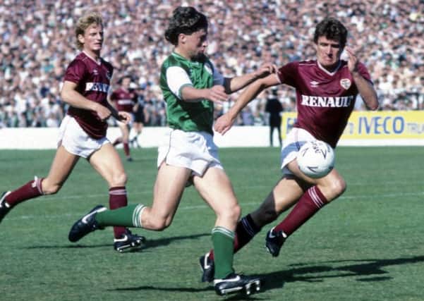 Hibs' Paul Kane is shadowed by the late Sandy Jardine. Picture: SNS